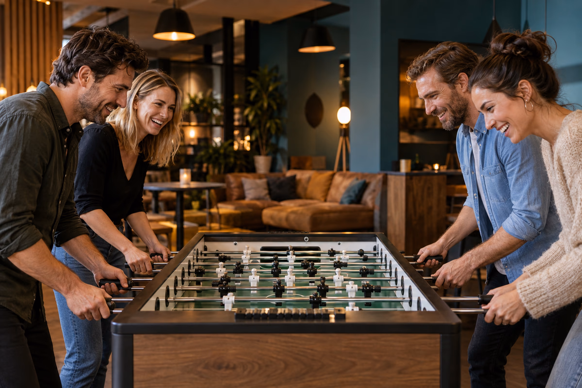 Teamevents – Team spielt gemeinsam Tischfussball