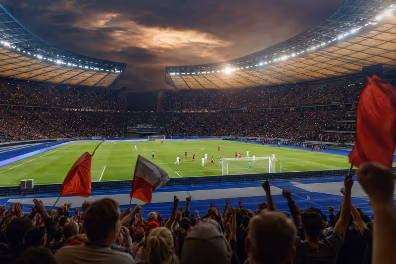 KI-generierte atmosphärische Szene eines Fußballfinales in einem großen Stadion