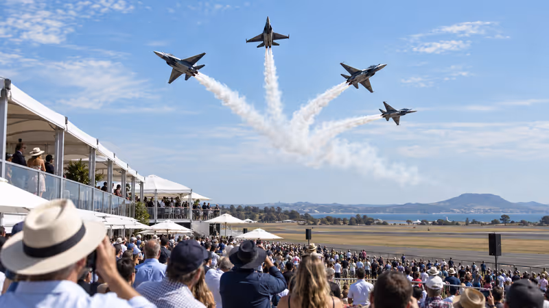 Jet aircraft performing above an Australian airshow crowd and corporate hospitality chalets. AI-generated image.
