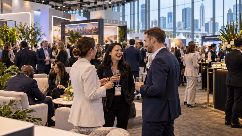 International business-event delegates networking in a modern Melbourne convention centre. AI-generated image.